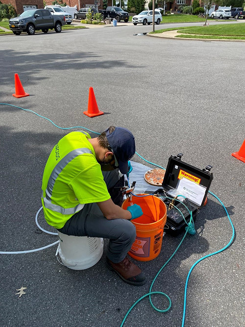 Northrop Grumman’s contractors collecting a routine groundwater sample on behalf of US Navy