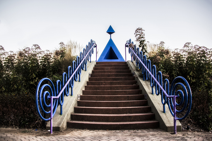 a picture of stairs with a purple spiral handrail in Cincinnati Ohio