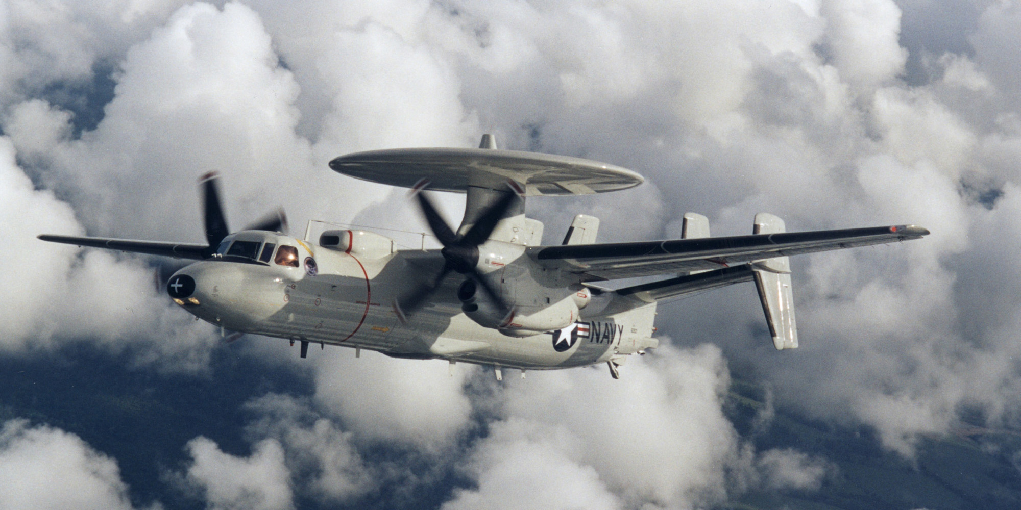 E-2C HAWKEYE 2000 military aircraft flying against clouds