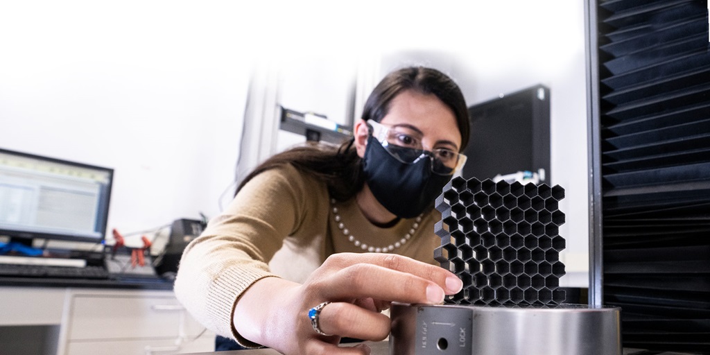 woman working on 3D printer