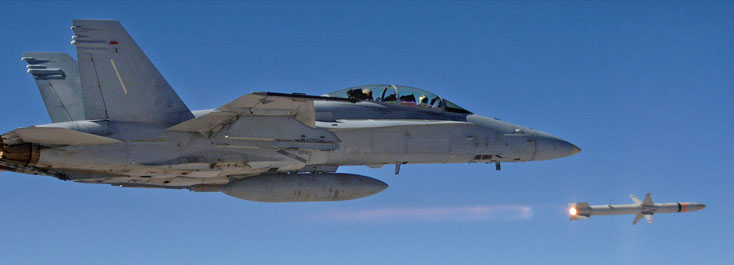 aircraft firing an Advanced Anti-Radiation Guided Missile (AARGM) in the blue sky