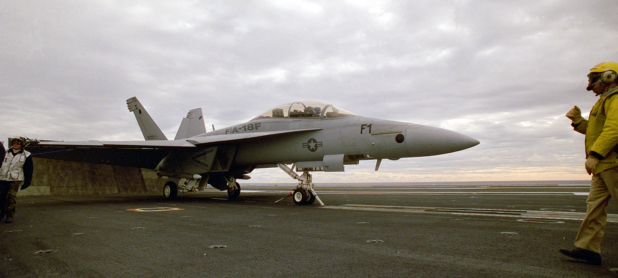 F/A-18 Super Hornet taking off from a aircraft carrier.