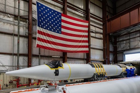 rocket being assembled in cleanroom