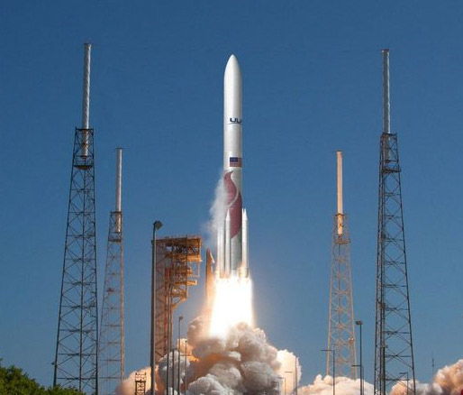 rocket taking off from launch pad