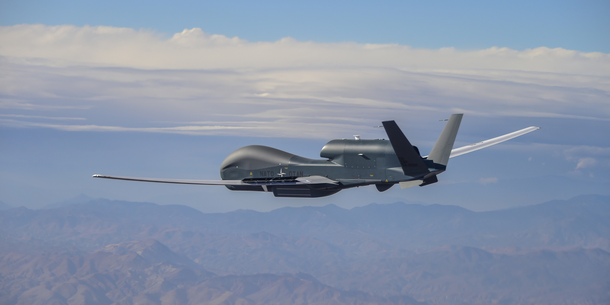 NATO ALLIANCE GROUND SURVEILLANCE (AGS) unmanned military aircraft flying in the sky