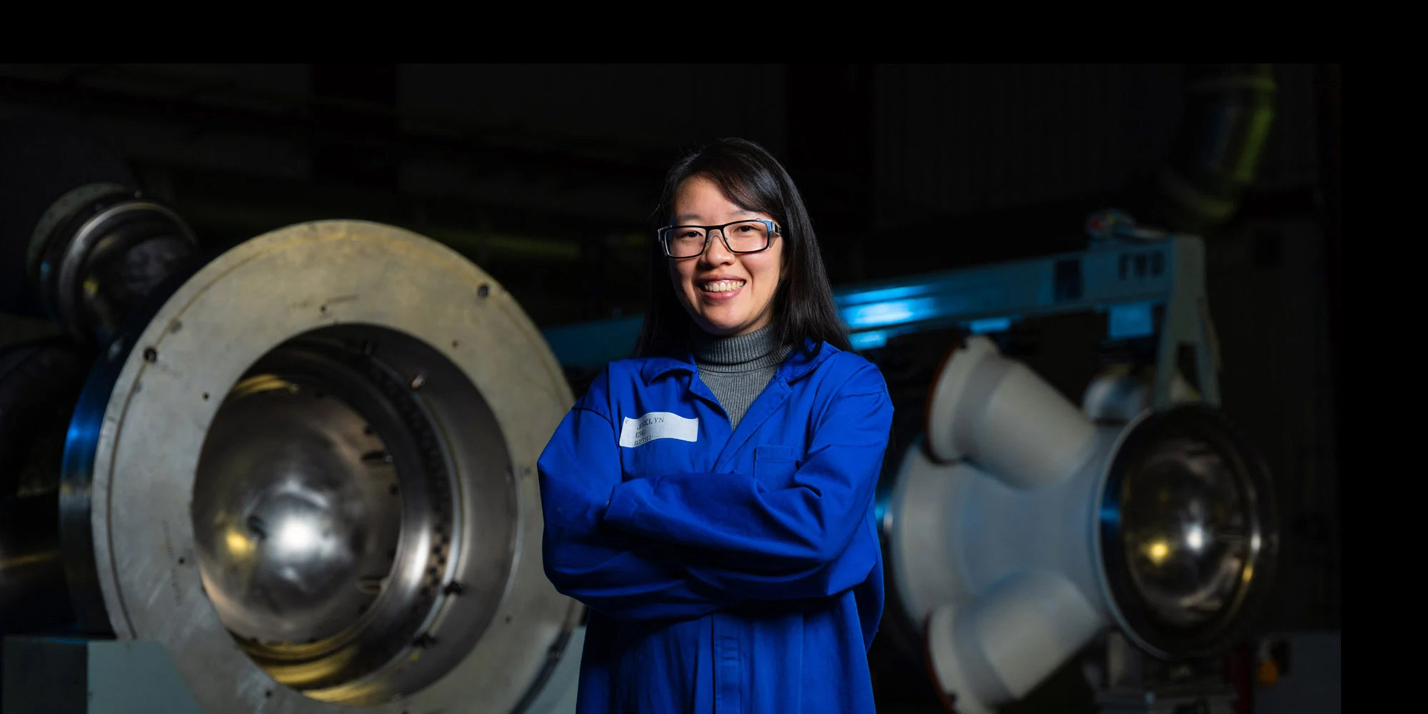 Hiring Manager hero – Life at Northrop Grumman Female employee smiling with arms crossed