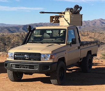 army truck with gun mounted in bed