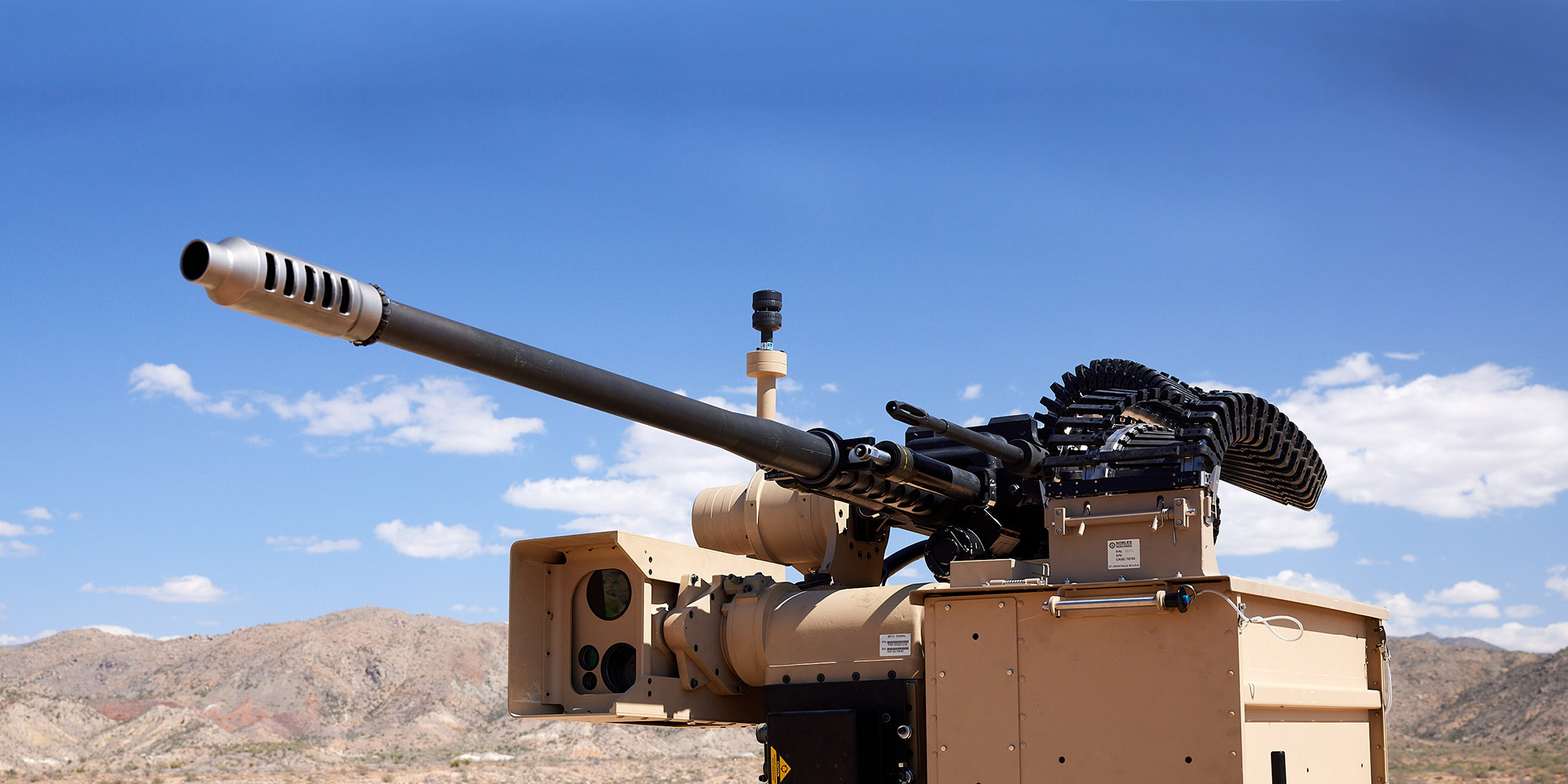 large military gun mounted on a truck