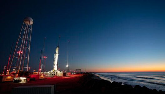 Artemis rocket on launchpad at sunset