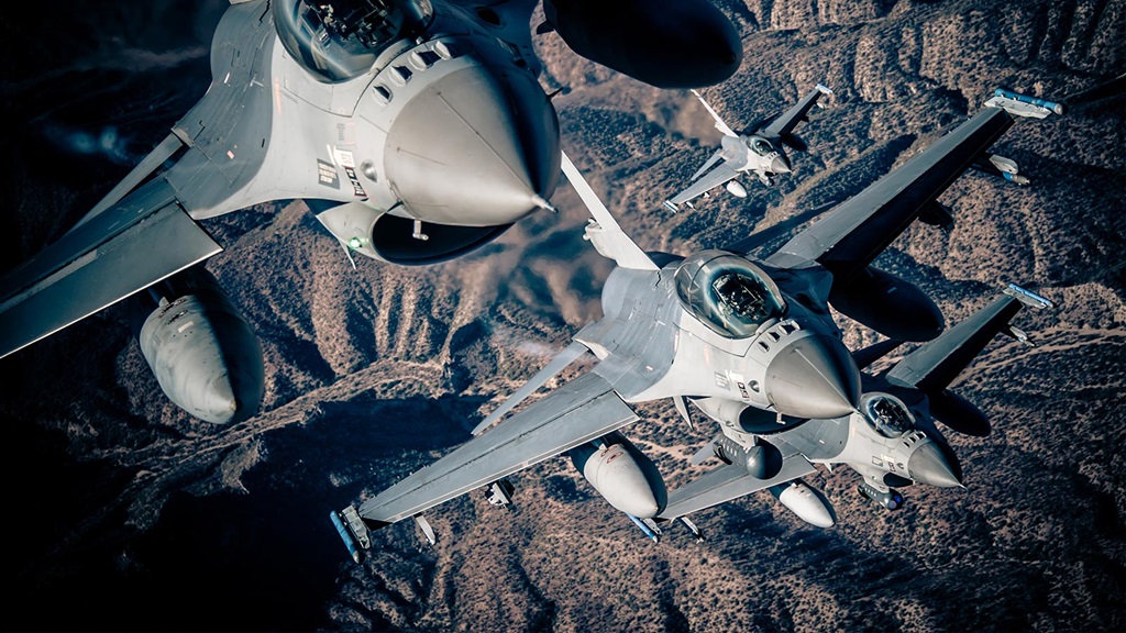 three military jets flying toward sky