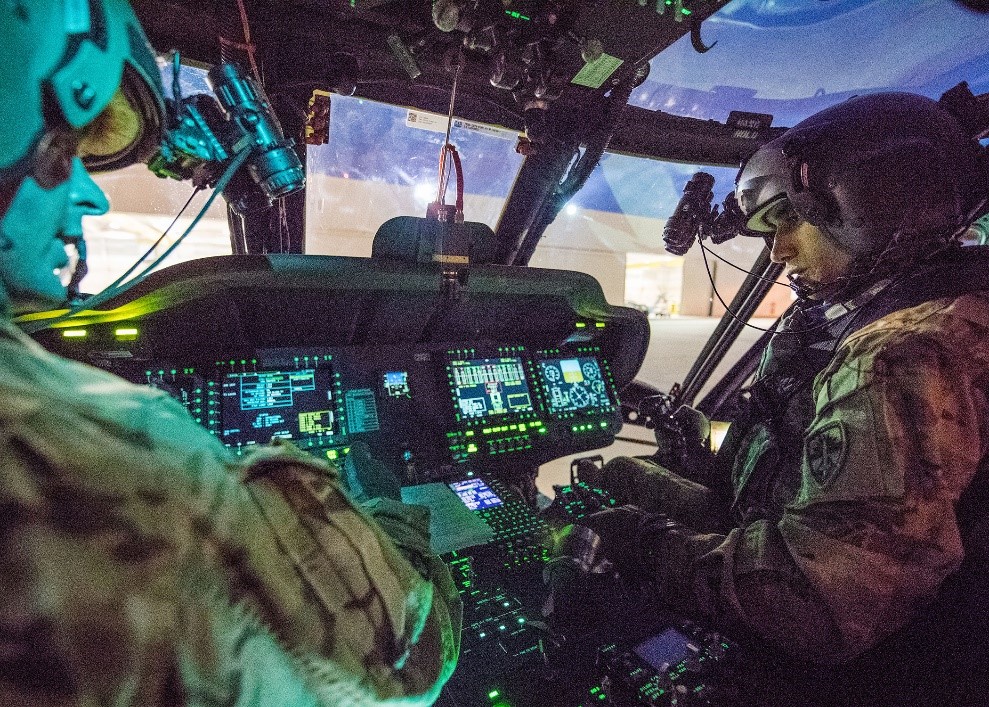 military helicopter cockpit with pilots