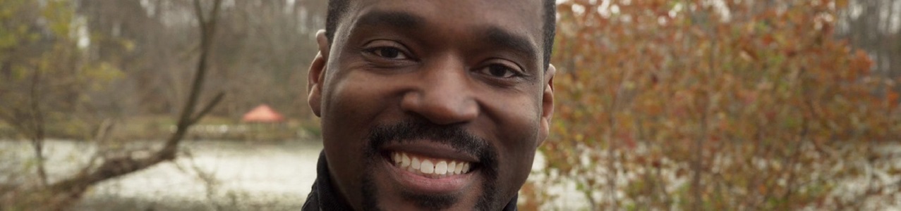 African American Male Headshot outdoors