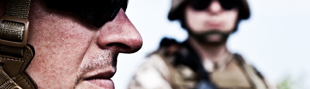 Close-up with two male military soliders