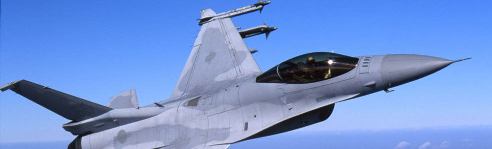 A fighter jet flies through the air