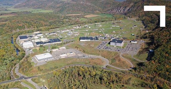 aerial view of city in mountains