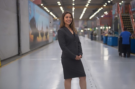 hispanic woman in a large building