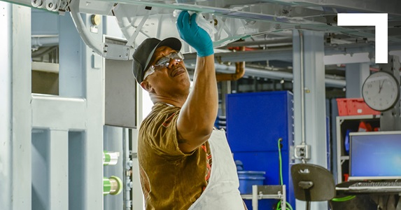 Employee working on aircraft