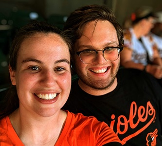 Two people smiling in a selfie. 