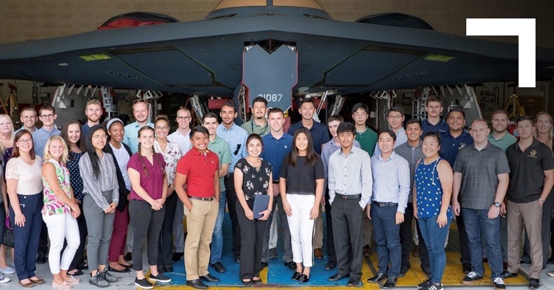 Group of employees standing for group photo