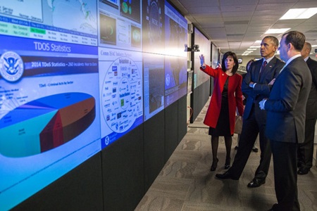 business women giving presentation in front of screen of powerpoint slides