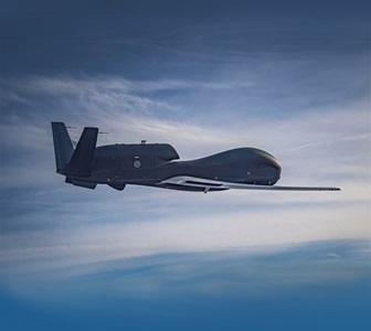 aircraft inflight against blue sky