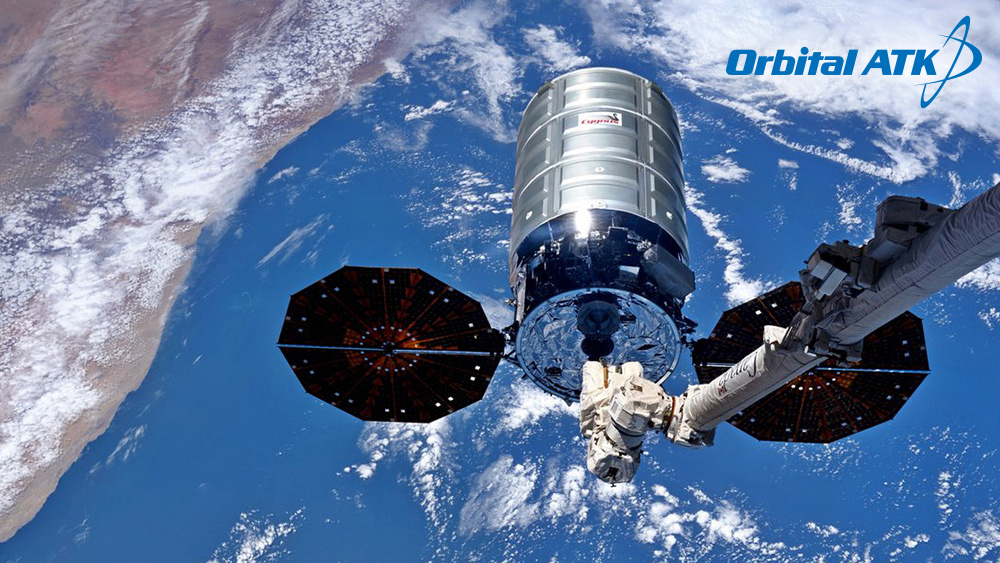 Our Heritage – Orbital ATK space craft above earth