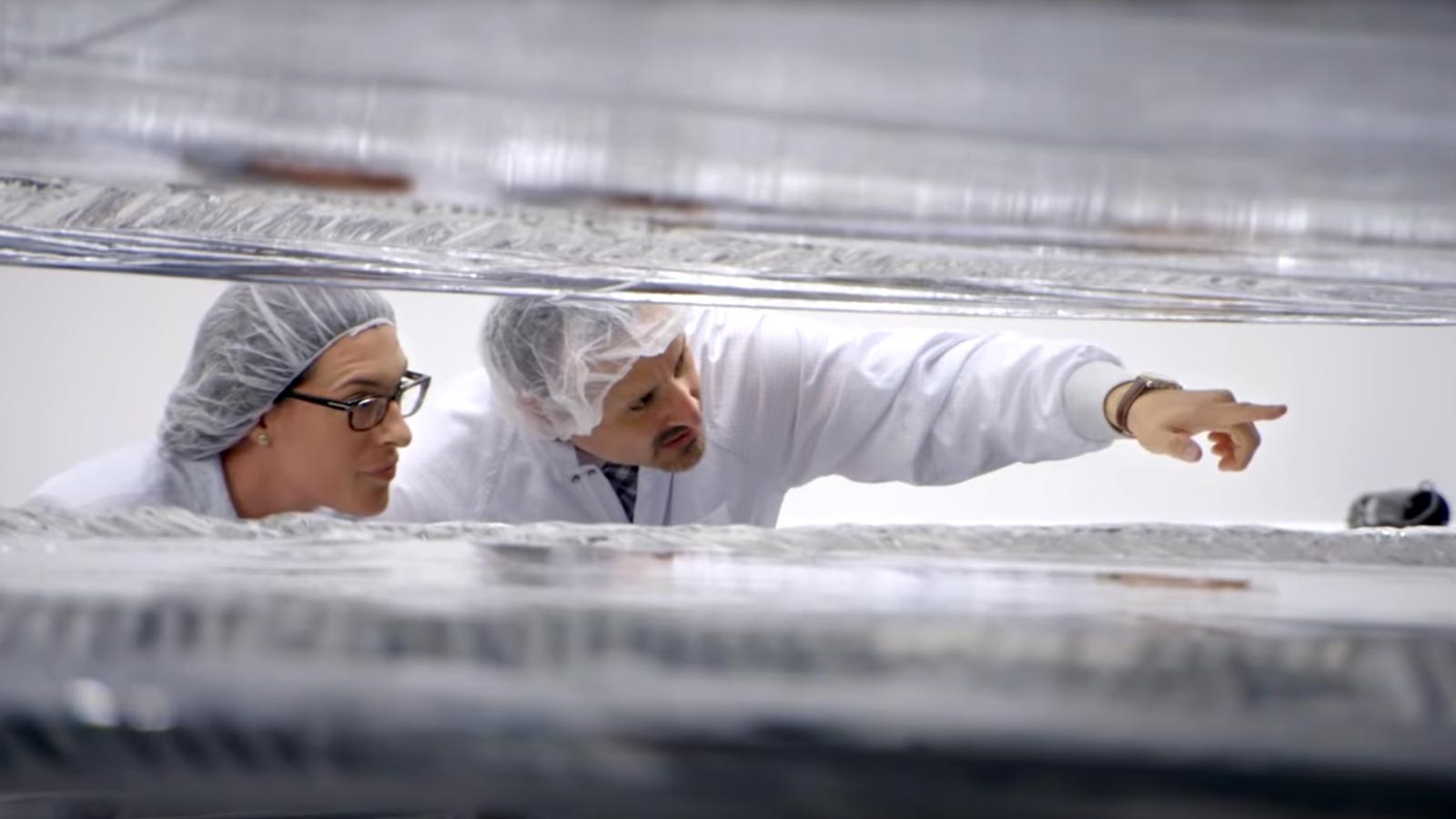 two engineers working on telescope