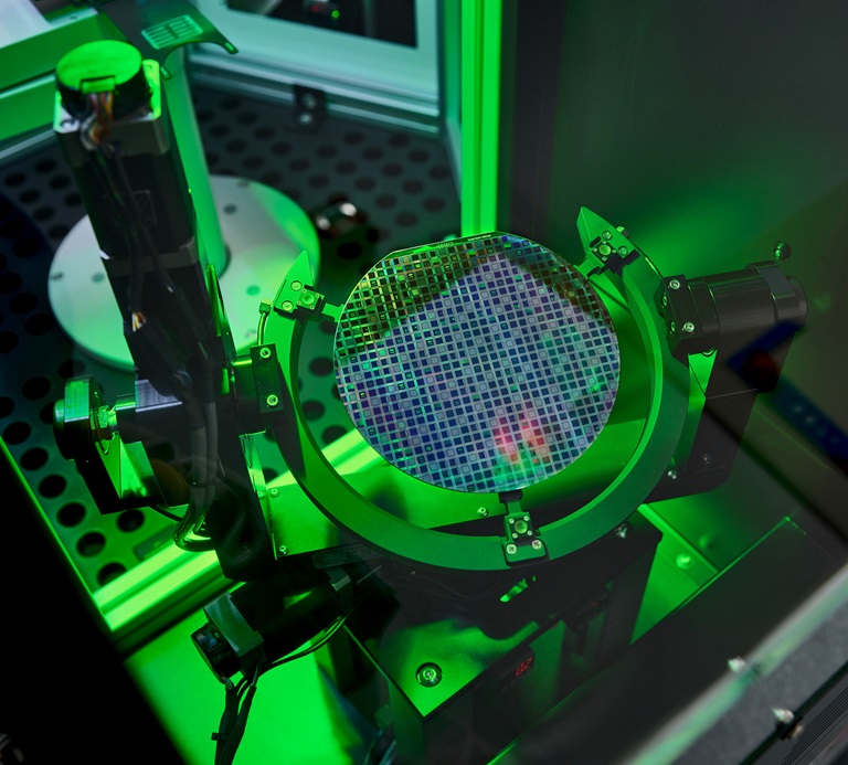 A Silicon Multi-Project Wafer (MPW) going through flat alignment prior to being processed in one of ATL’s Class 100 cleanroom