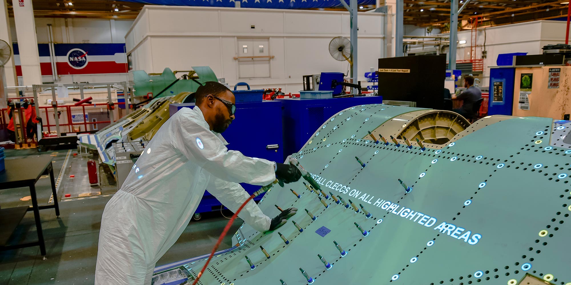 black man working on F-35