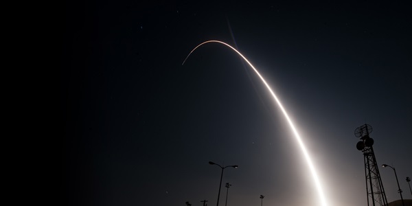 missile streaking across night sky