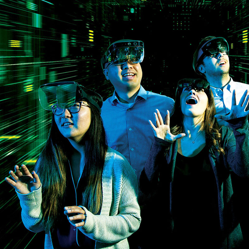 shared-contentHero- five people wearing VR goggles in dark room