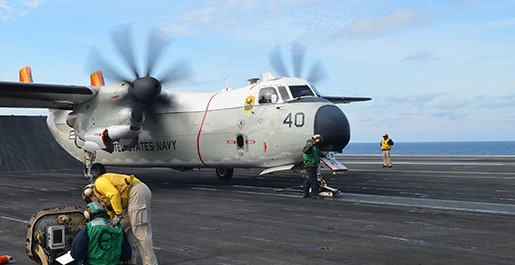 C-2A Greyhound aircraft and crew on runway