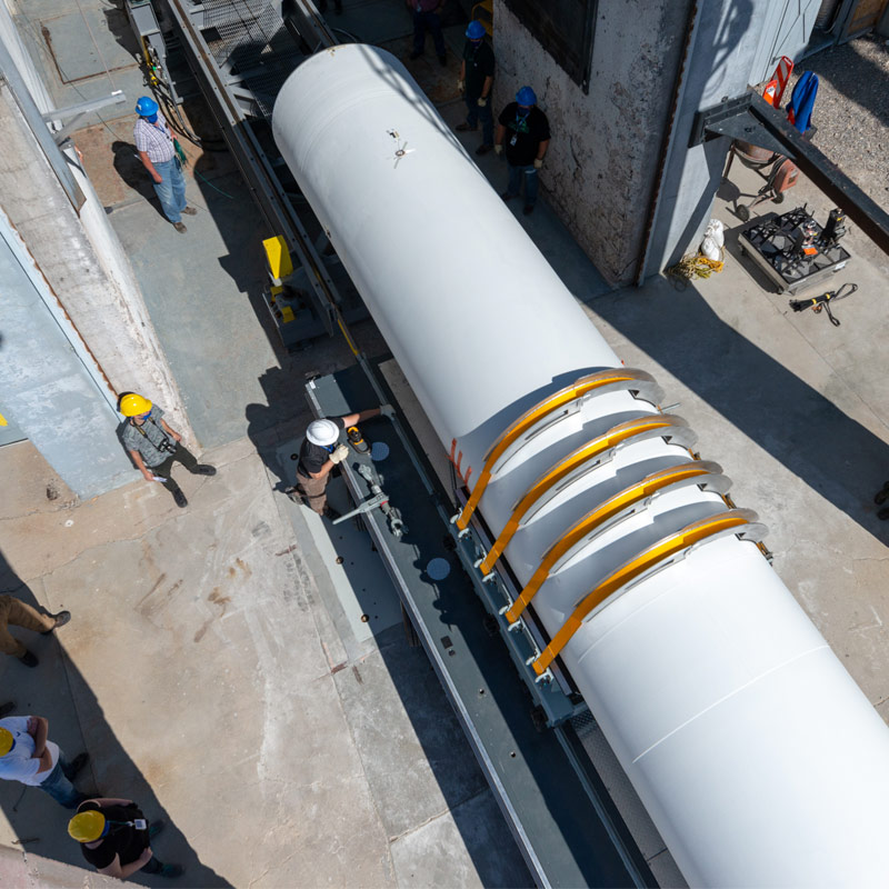 workers buildling a rocket