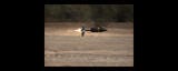 ammunition round flying through air