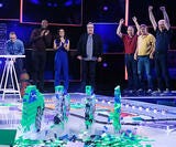 seven people competing in a domino event