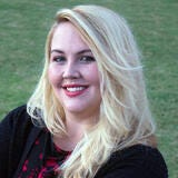 headshot of white woman with blonde hair