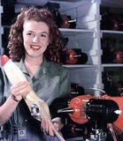 woman working on aircraft parts