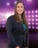 Caucasian female against puple spotlight background