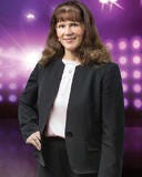 Caucasian Female Posing in front of purple backdrop