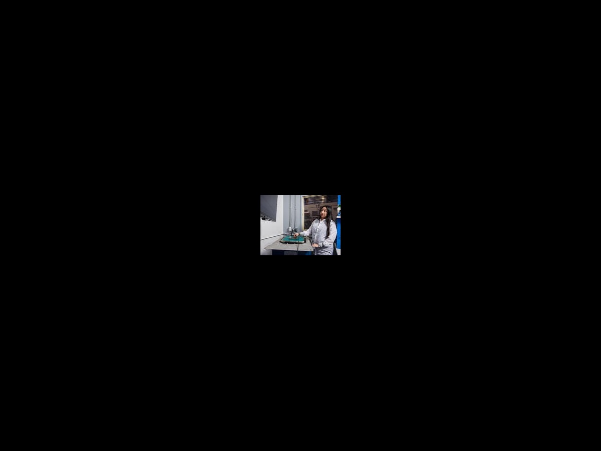 woman in lab coat