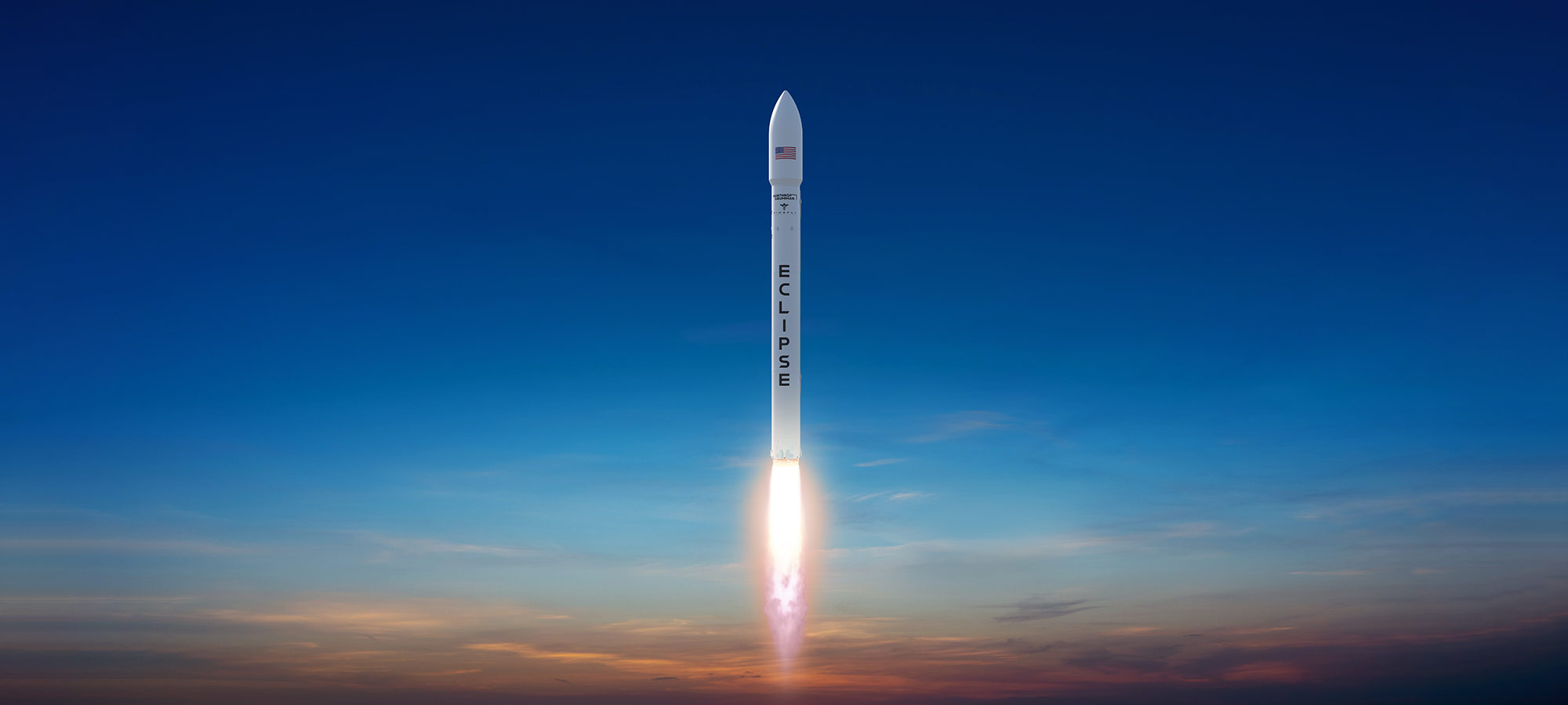 Eclipse rocket launching into dark blue skies