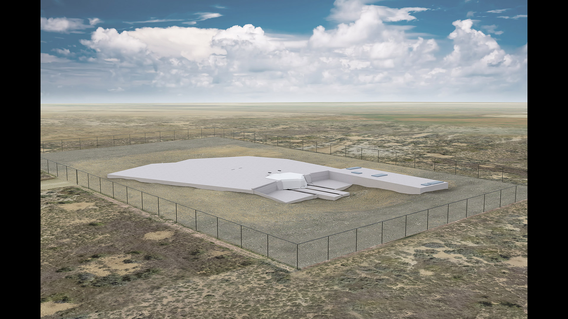 buildings in green field and blue cloudy skies