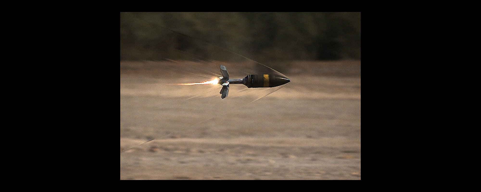 ammunition round flying through air