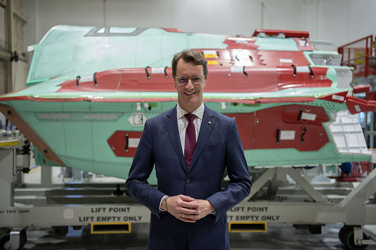 NRW Minister President Hendrik Wüst in front an F-35 center fuselage at Northrop Grumman’s F-35 Integrated Assembly Line facility in Palmdale, California.