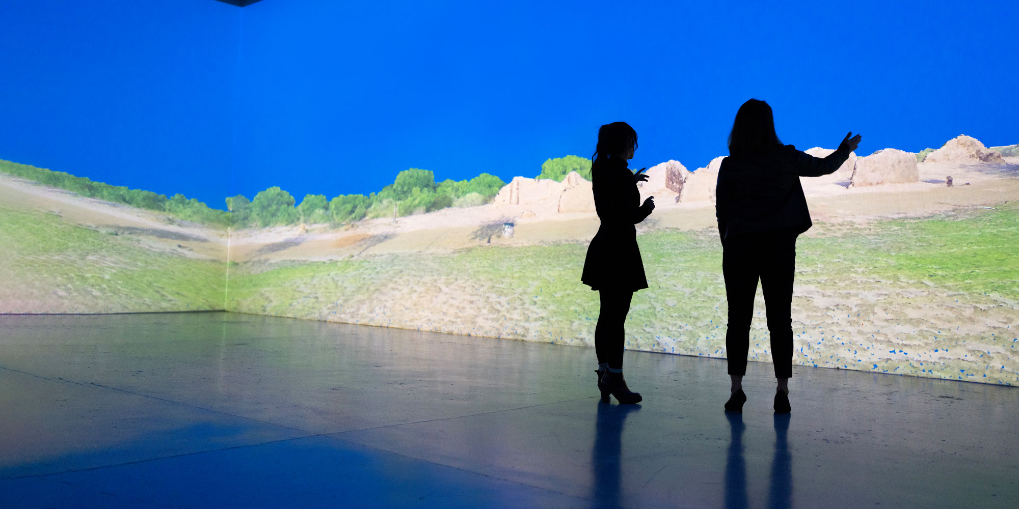 Top: A member of the Northrop Grumman SITEs team and the New Mexico Humanities Council examine a 3D scan of Ft. Selden, a historic site in New Mexico.