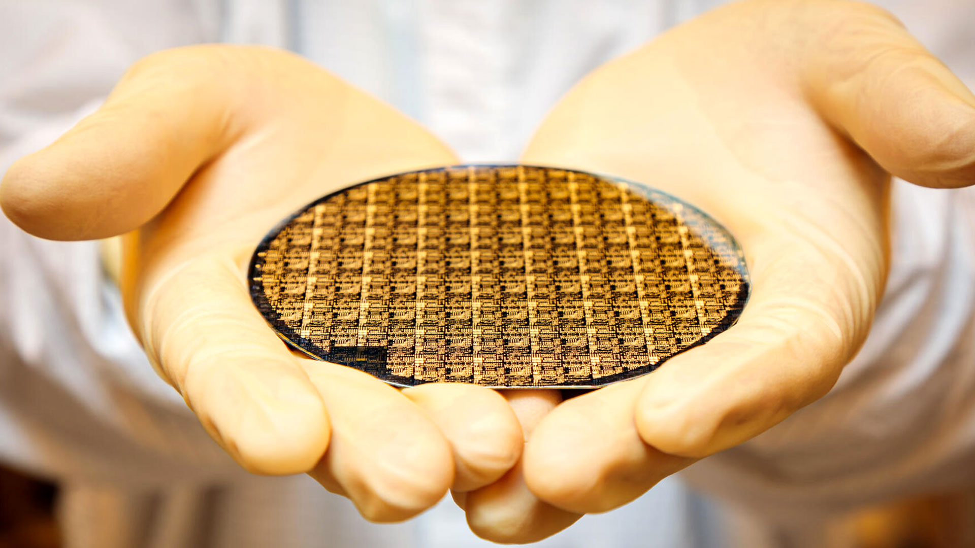 Microelectronics held on hands.