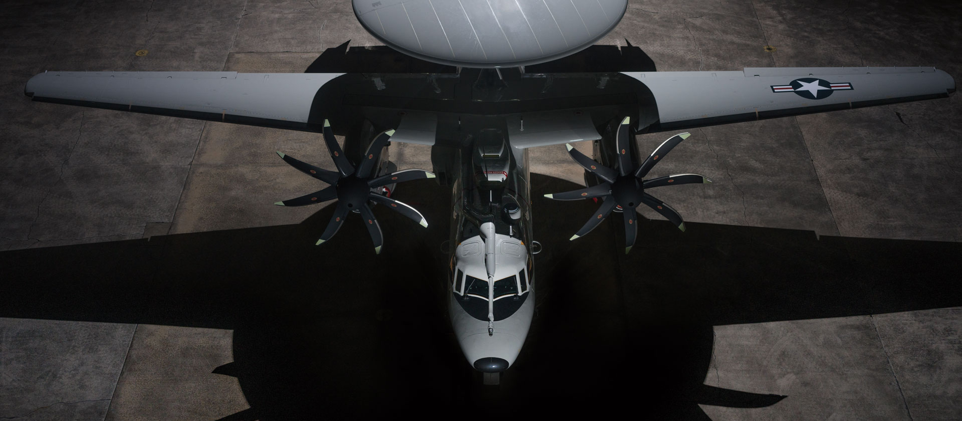 E-2D Image in dark hangar with spotlight