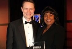 Wes Bush and Gloria Pualani accept the Supplier Diversity Corporation of the Year Award 2012