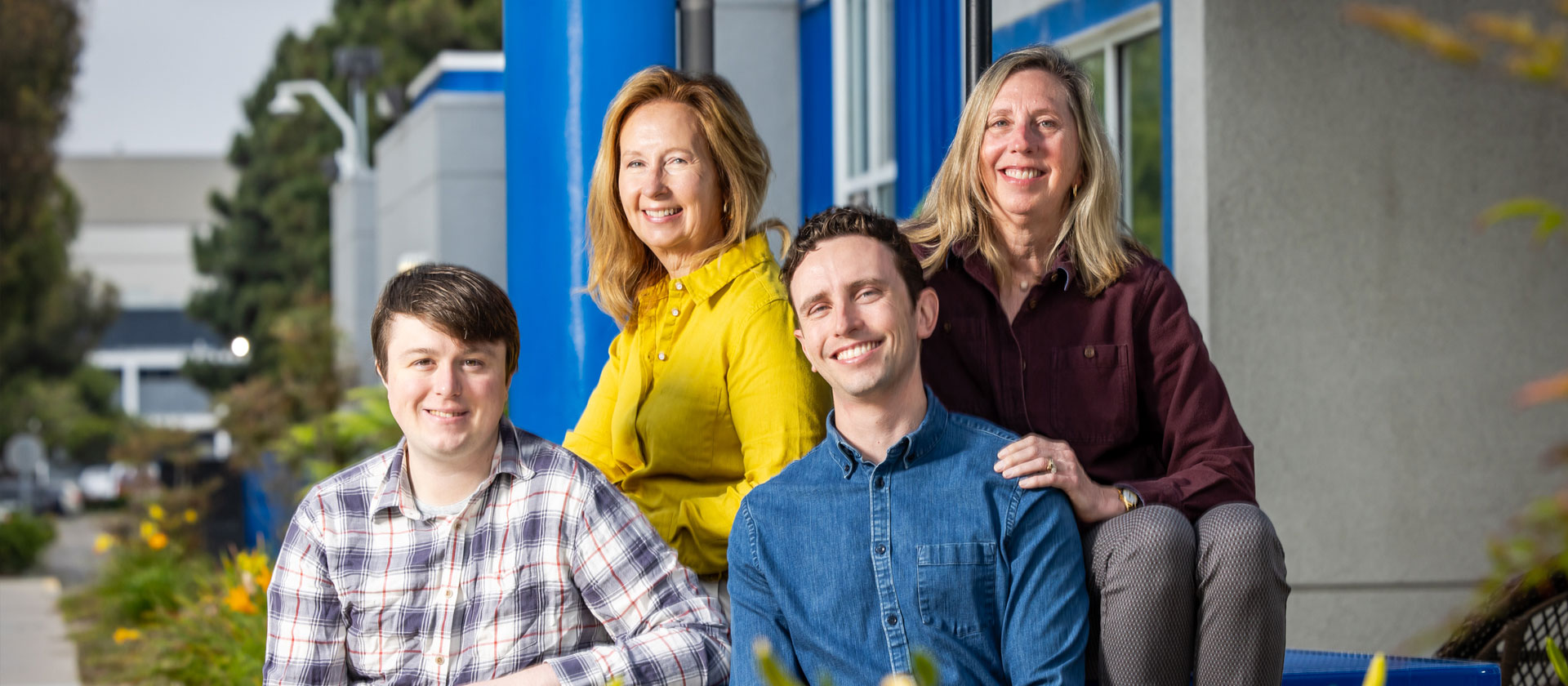 Picture of smiling family in group photo.