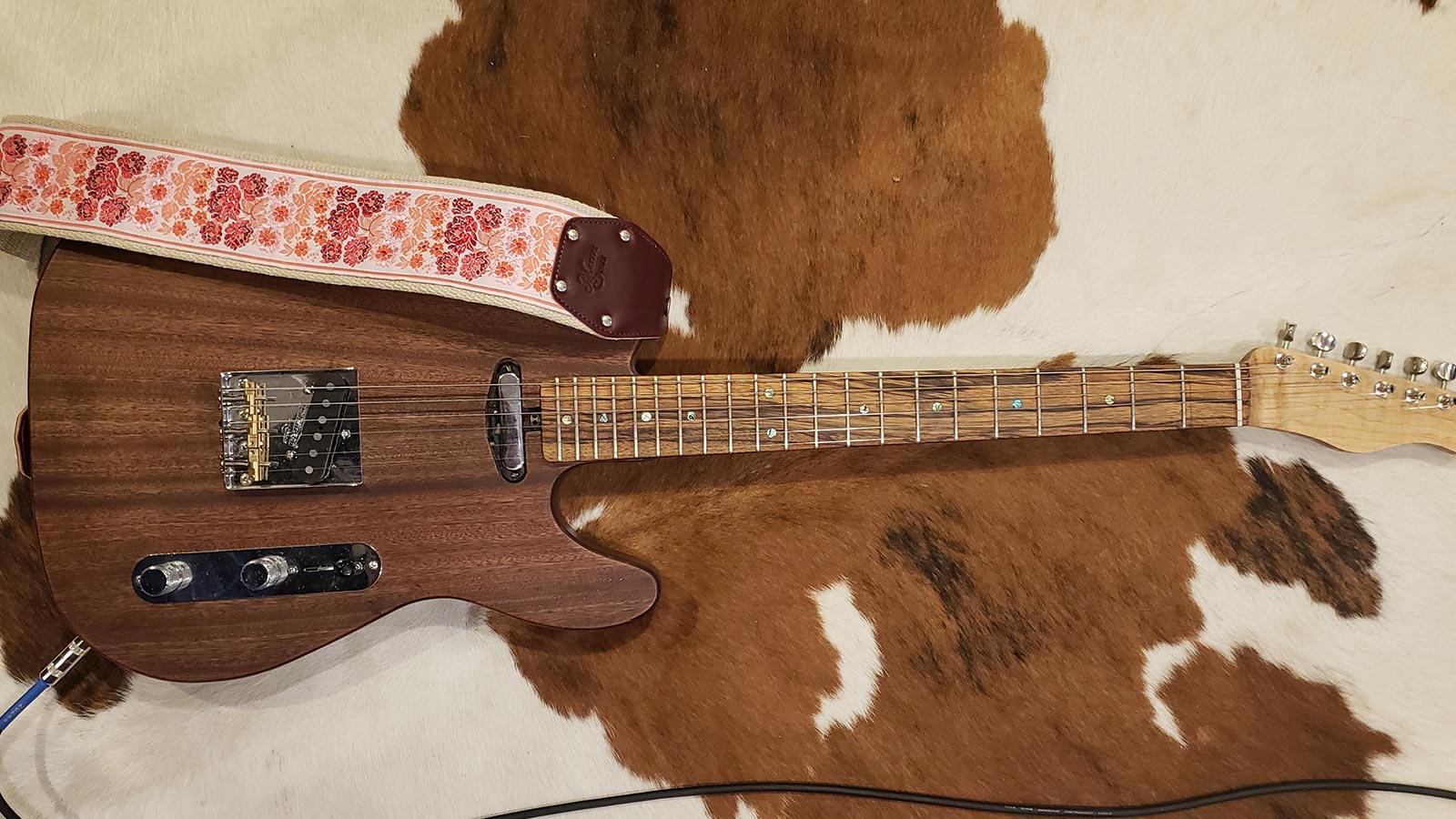 Photo of a wooden guitar